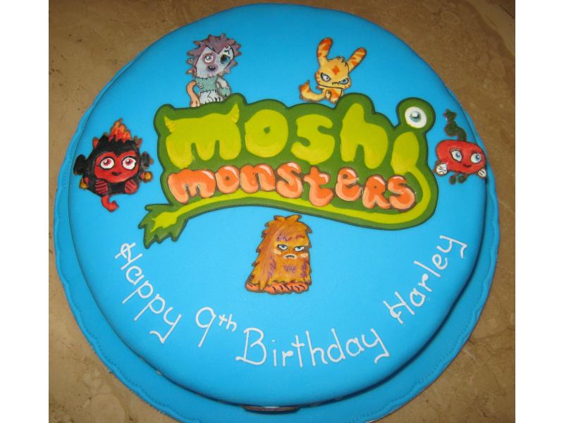 A 10" round Madeira sponge cake, based on the cartoon characters Moshi Monsters for Harley of Bispham