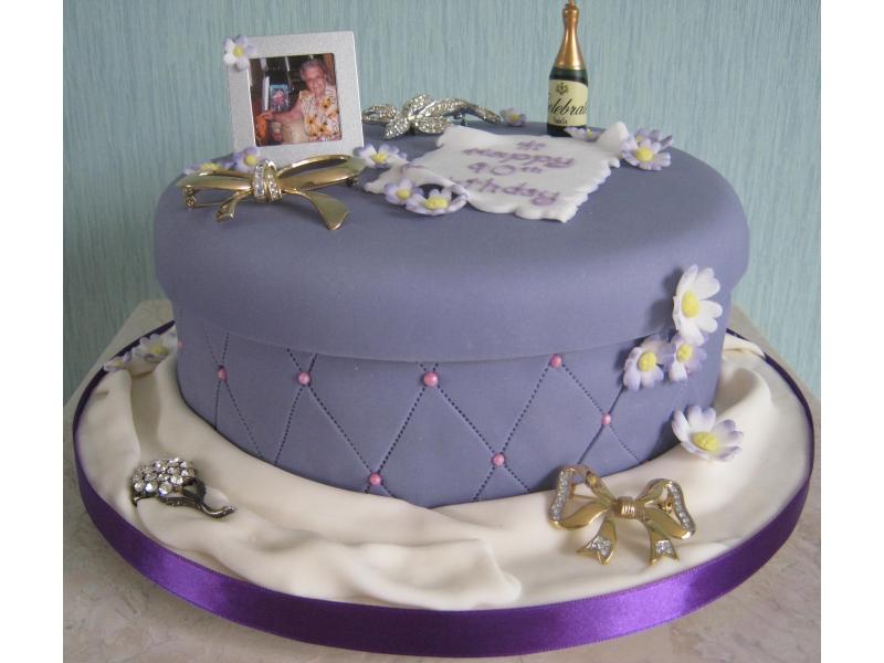 Memories Two in vanilla sponge with personal mementoes