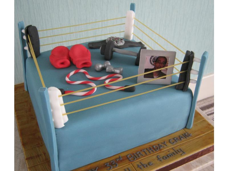 Craig in Blackpool 33rd birthday in chocolate sponge showing interests in boxing and fitness