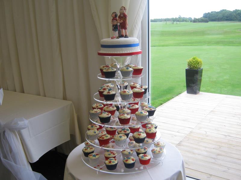 Red, white & blue themed wedding cupcakes for Laura in Staining from Madeira sponge with personalised figures
