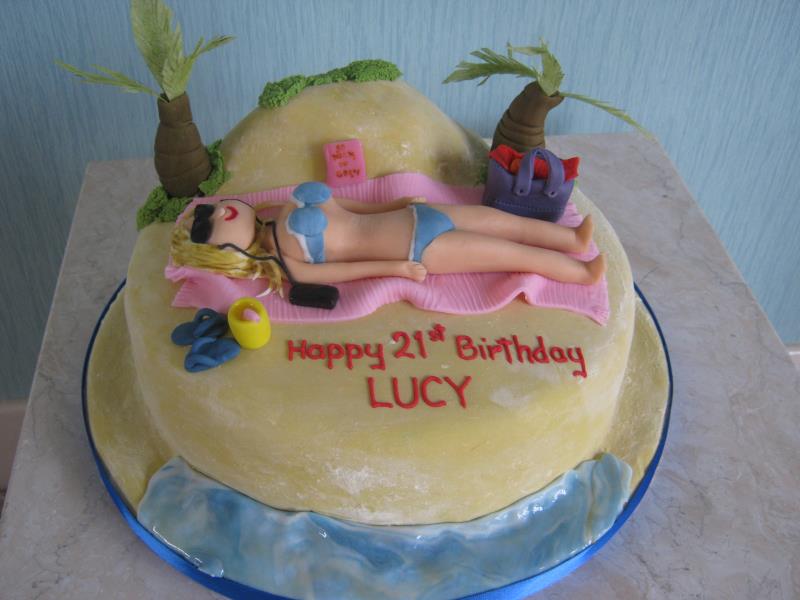 Beach themed cake for a blond with sunglasses ina bikini for Lucy's 21st in Poulton
