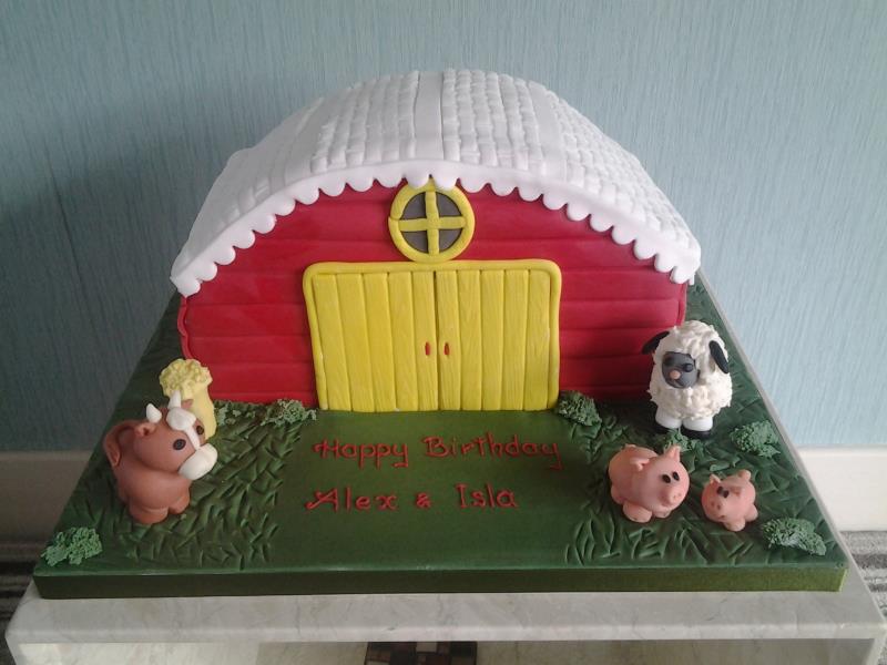 Red Barn with farmyard animals in chocolate sponge for a joint birthday in Preston
