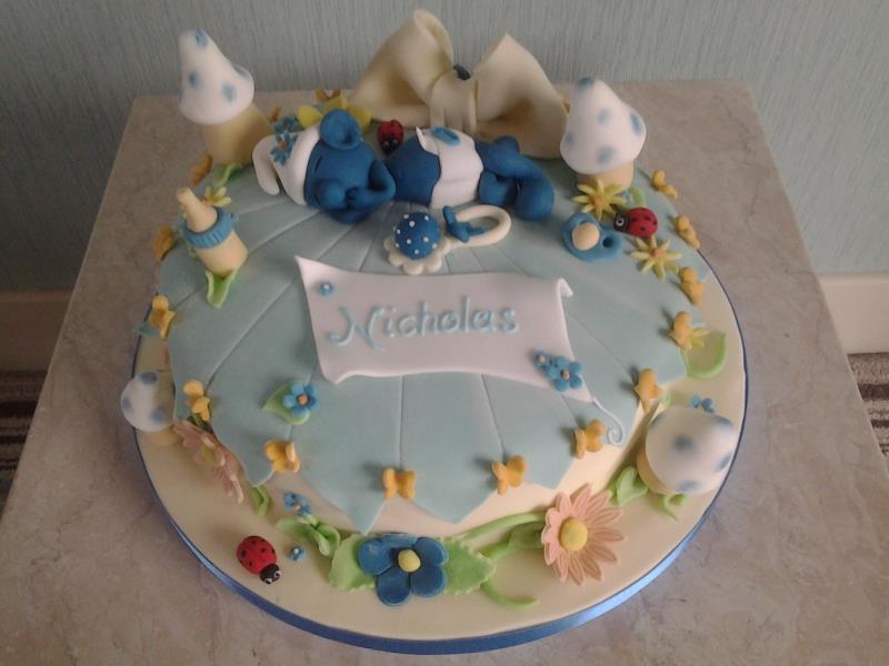 Sleeping Smurf for Nicholas' first birthday in Blackpool, made from chocolate with orange sponge.