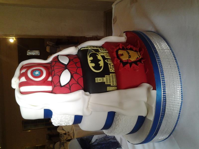 Marvel wedding cake with more traditional reverse view in 4 tiers of sponges