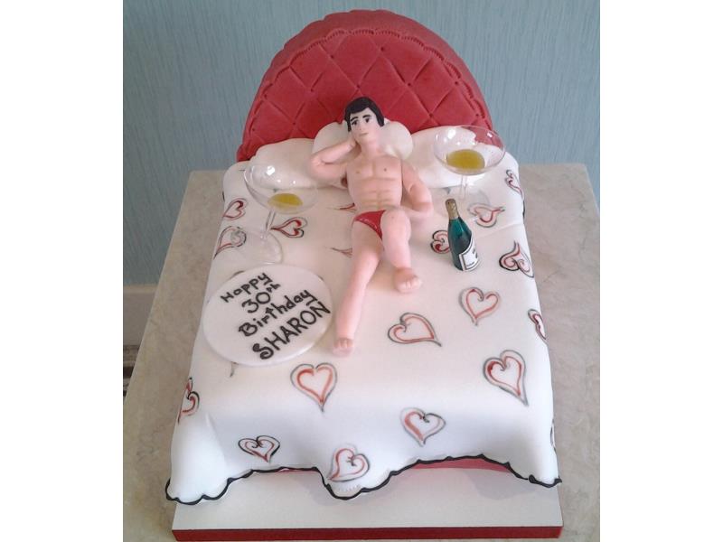 Champagne and a man in your bed for Sharon's birthday in Blackpool. Made from plain sponge