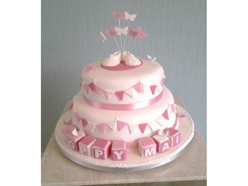 Bootees & Bunting for Poppy's Christening in Thornton-Cleveleys, made from chocolate with orange sponge and lemon sponge.