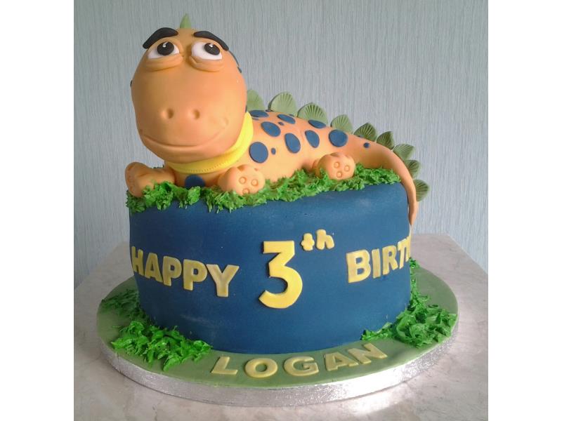 Friendly dinosaur cake for Logan in Blackpool, made from vanilla sponge