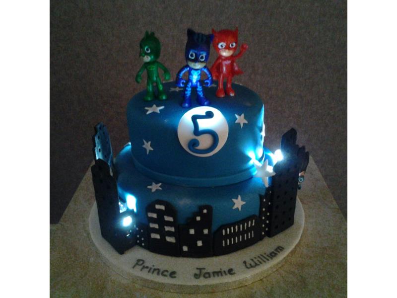 2 Tier PJ Masks with lights for Jamie in Cleveleys. Made with chocolate sponge