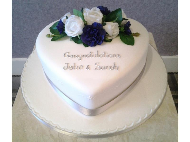 Heart - classy and simple heart shaped wedding cake for John and Sarah in South Shore. Made from vanilla sponge.