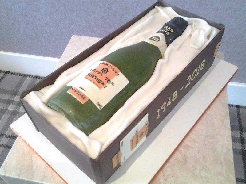 Veuve Clicquot wine bottle, for Warren's 70 th in Blackpool. Made from lemon sponge.