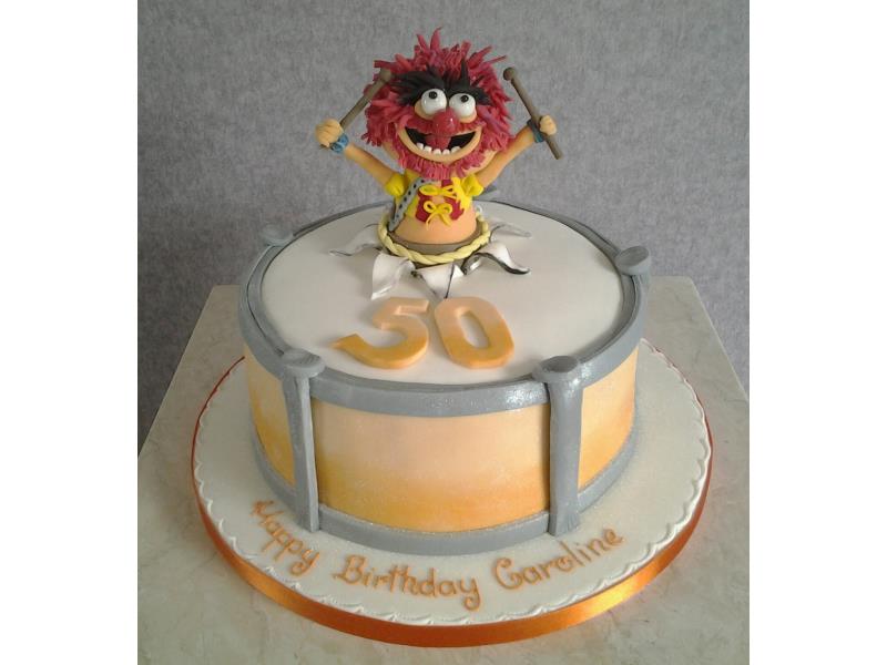 Muppets Animal bursting from vanilla sponge drum for a special 50th in Blackpool