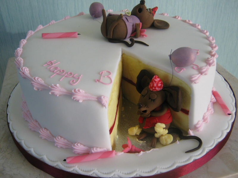 Mice Eating Cake - Yes, really! The mice have eaten a slice of this lovely birthday cake.